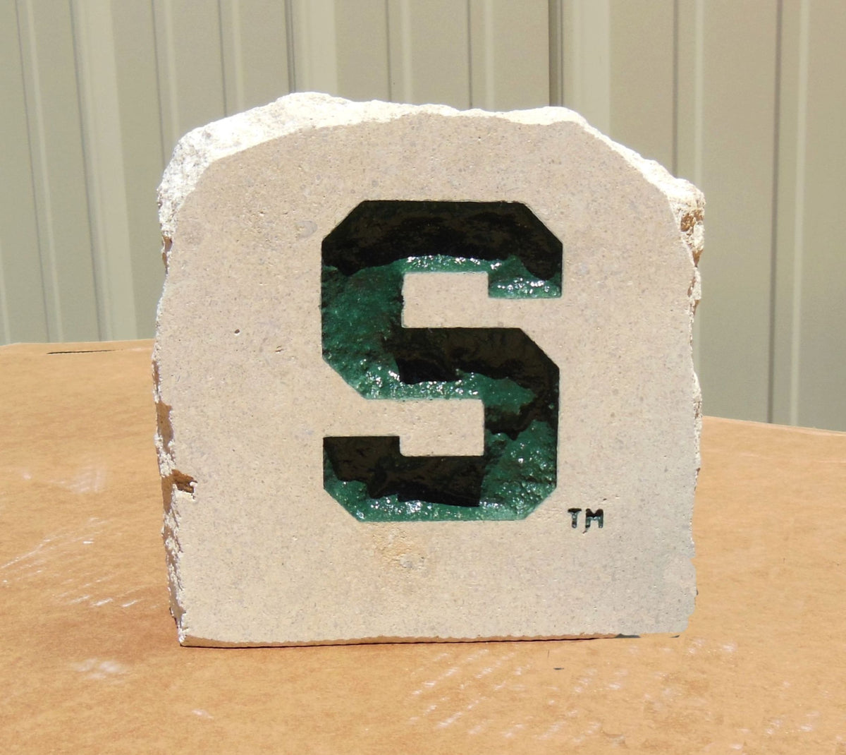 Show your love for the Michigan State University Spartans when you add this Engraved Limestone Decorative Stone to your collection.