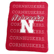 Nebraska Classic Repeating Team Name Fleece Throw
