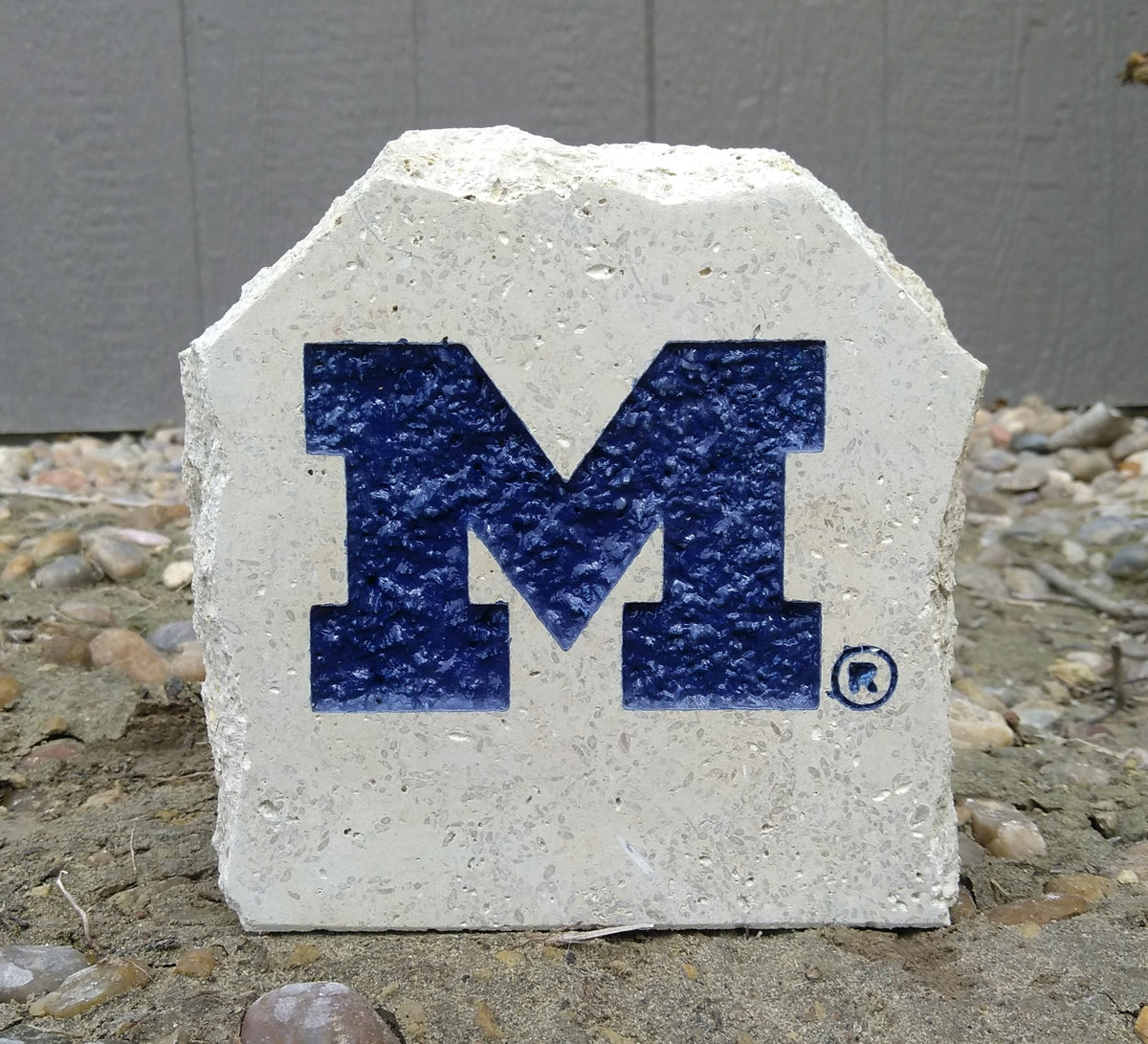 Show your love for the Michigan Wolverines when you add this Engraved Limestone Decorative Stone to your collection.